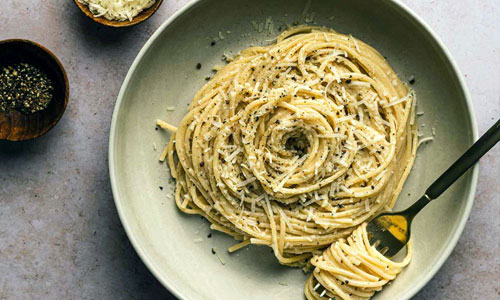 Premium prepared Cacio e Pepe pasta served in a ceramic bowl